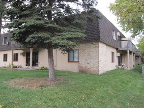 a house with a tree in the yard
