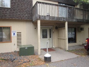 a house with a porch and a balcony