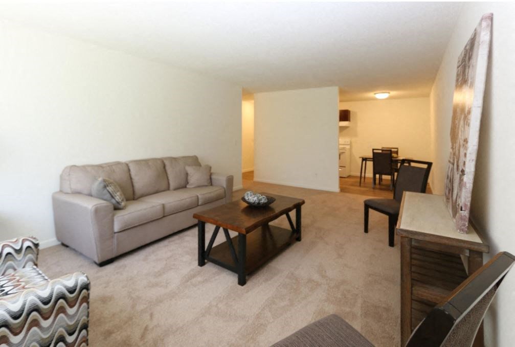 a living room with a couch and a table