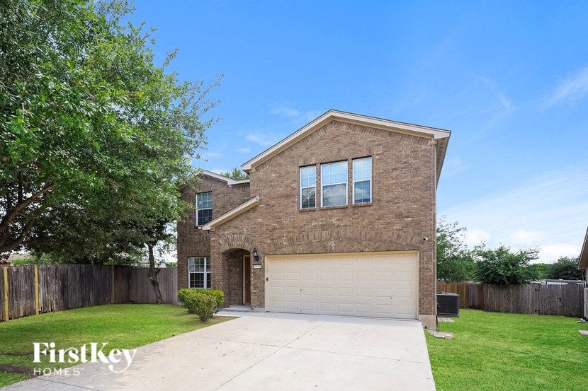 A house with a garage is for sale by FirstKey Homes.