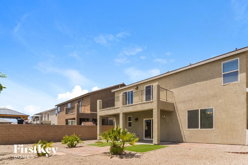 A building with the words "FirstKey Homes" on the ground in front of it.