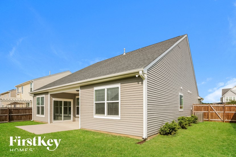 the view of the home from the back yard