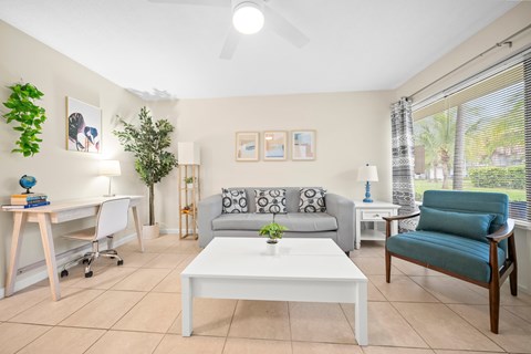 a living room with a couch and a table