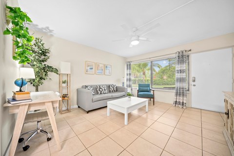 a living room with a couch and a table