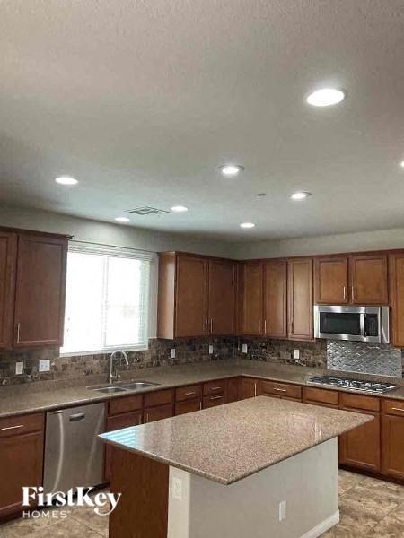 a kitchen with an island and a microwave