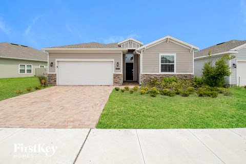 A house with a garage is for sale by FirstKey Homes.