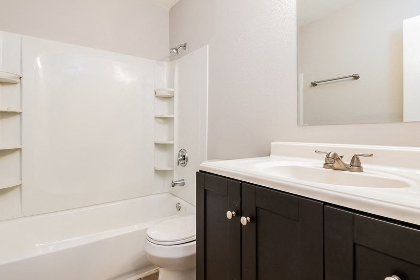 the preserve at ballantyne commons apartment bathroom with sink toilet and shower