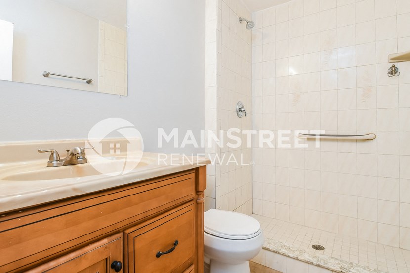 bathroom with shower and sink in the master bathroom