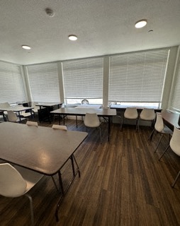 a dining room with tables and chairs
