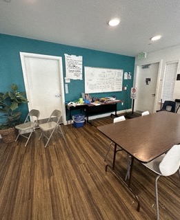 a conference room with a table and chairs