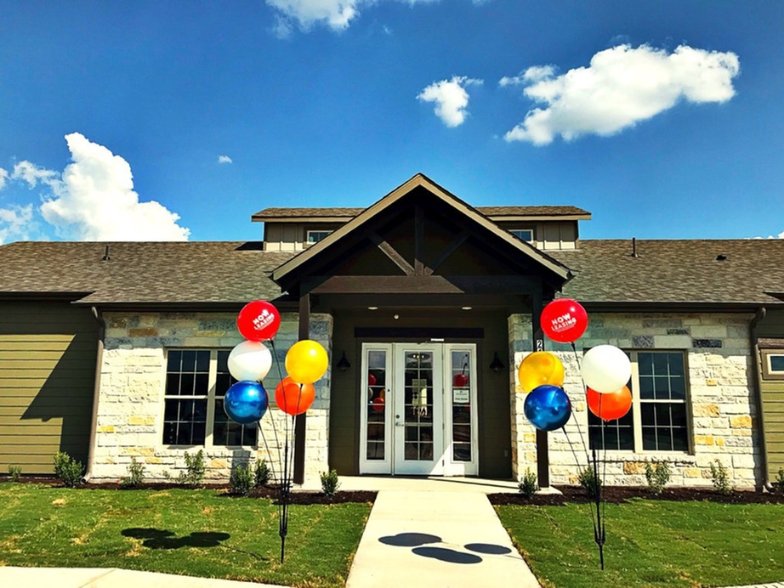 our balloons are out in front of our house for a birthday party