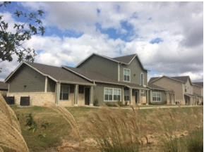 a house in the process of being built on a hill