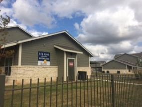 a church with a fence in front of it