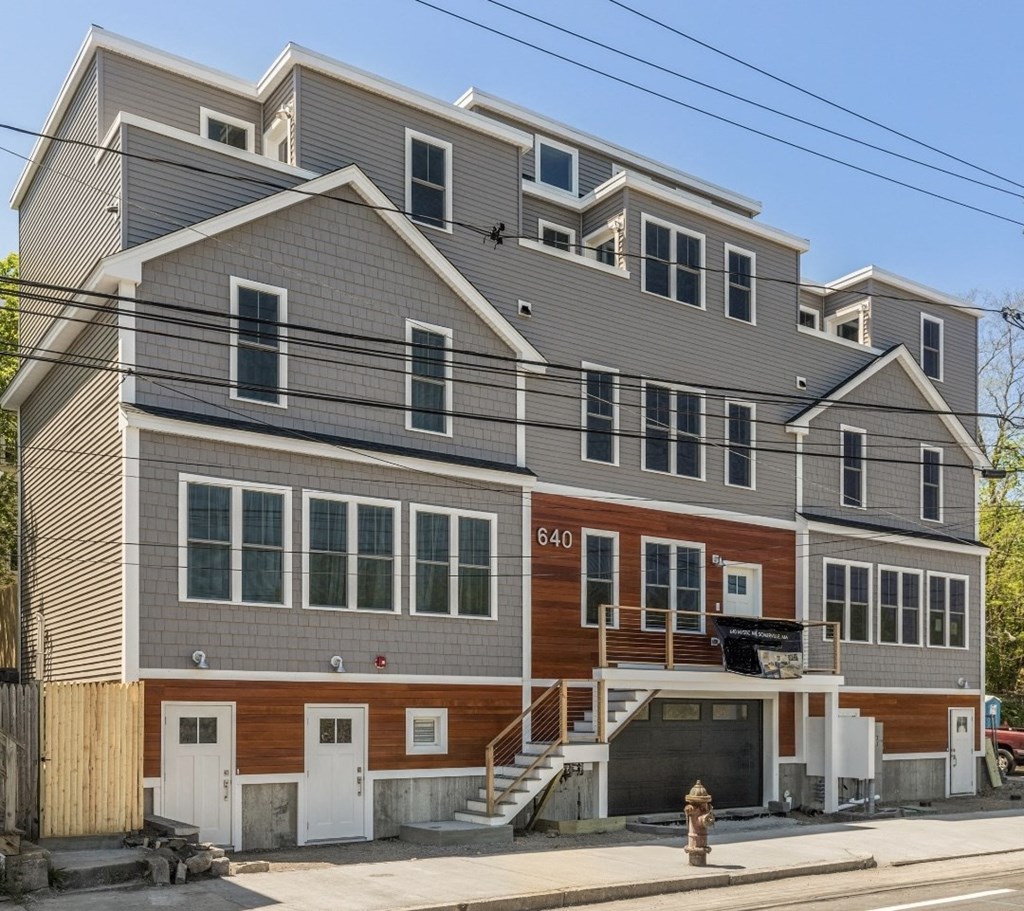 a building with a fire hydrant in front of it