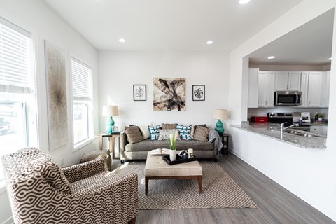 a living room with a couch and a table