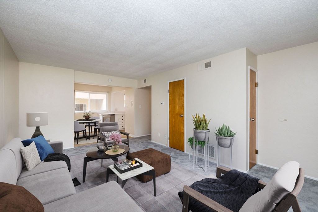 a living room with a couch and a table