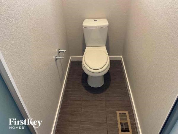 a small bathroom with a toilet in it