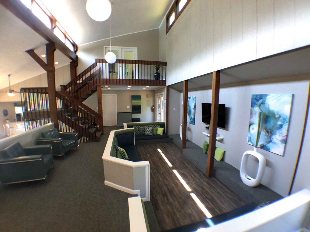 a rendering of a living room with a staircase