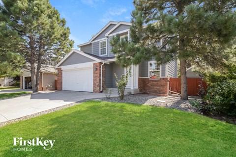 A house with a garage is for sale by FirstKey Homes.