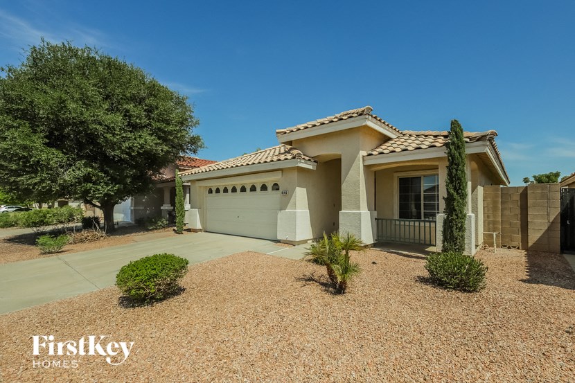 a house with a driveway and a garage door