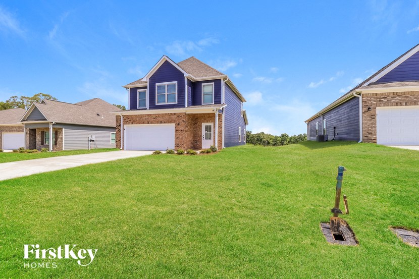 a large lawn in front of a house