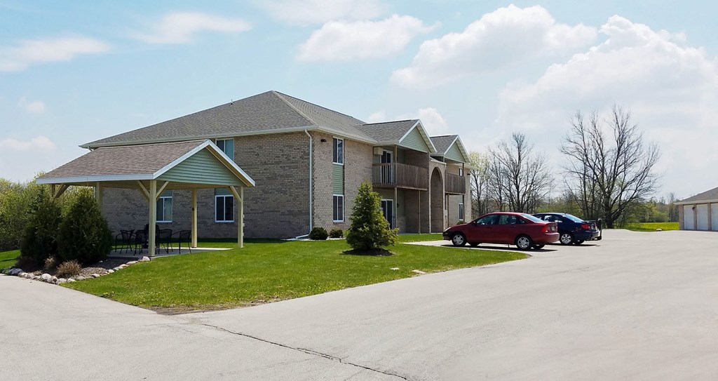 a house with cars parked in front of it