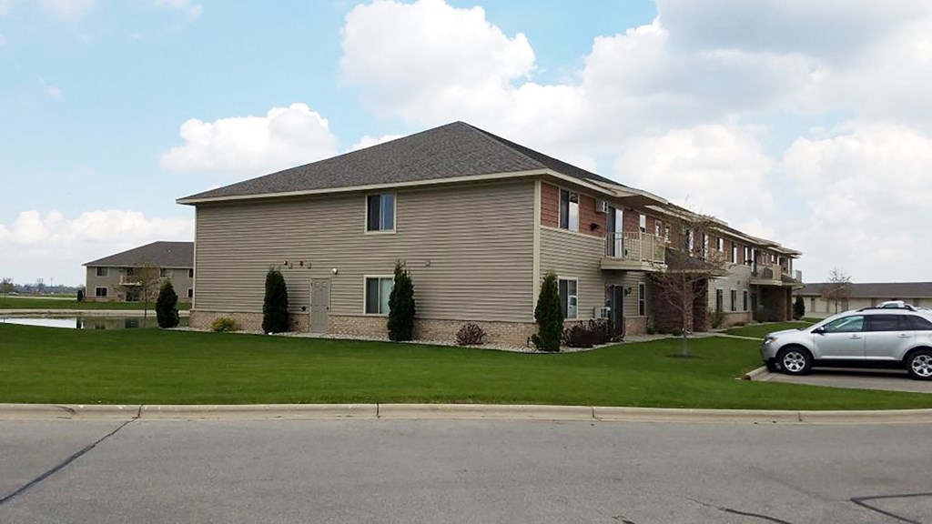 a house with a car parked in front of it