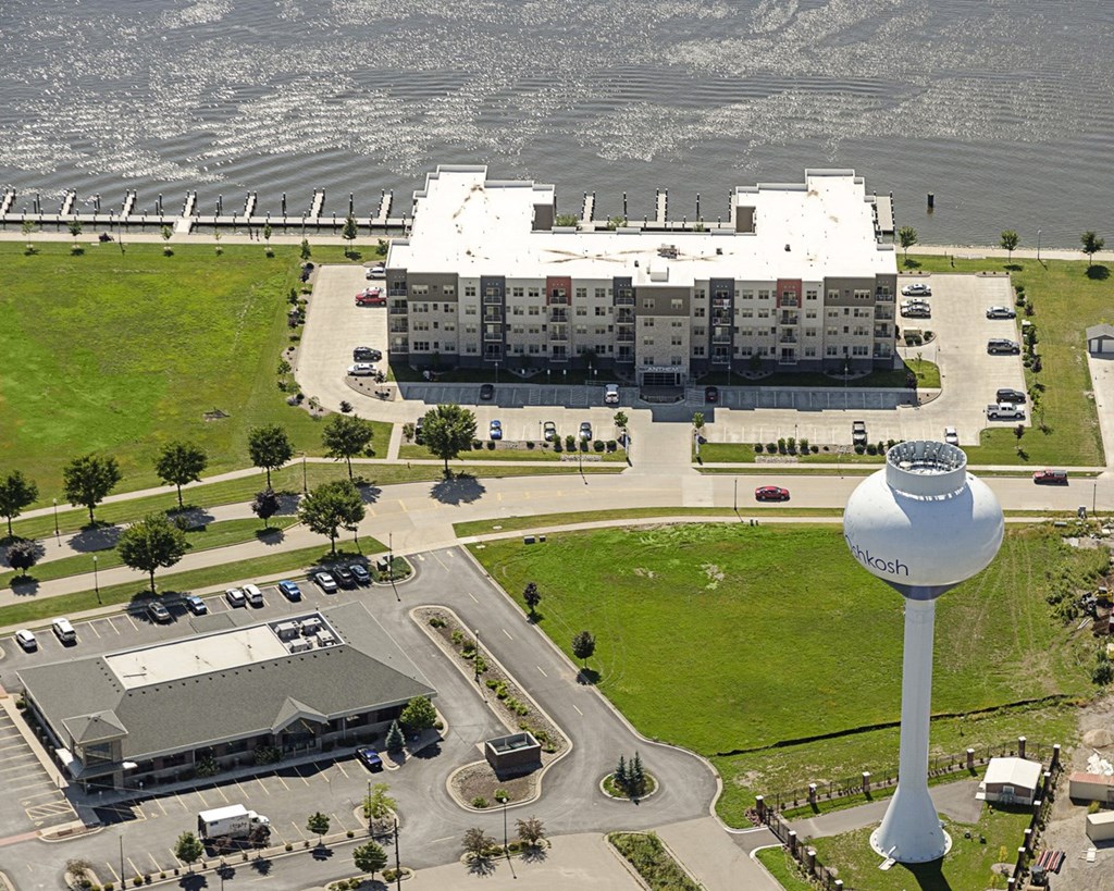 an aerial view of the hotel and water tower