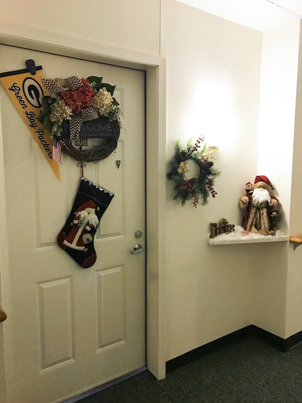 the door to our office is decorated for the christmas season