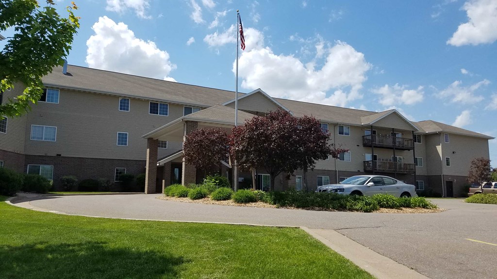 a building with a car parked in front of it
