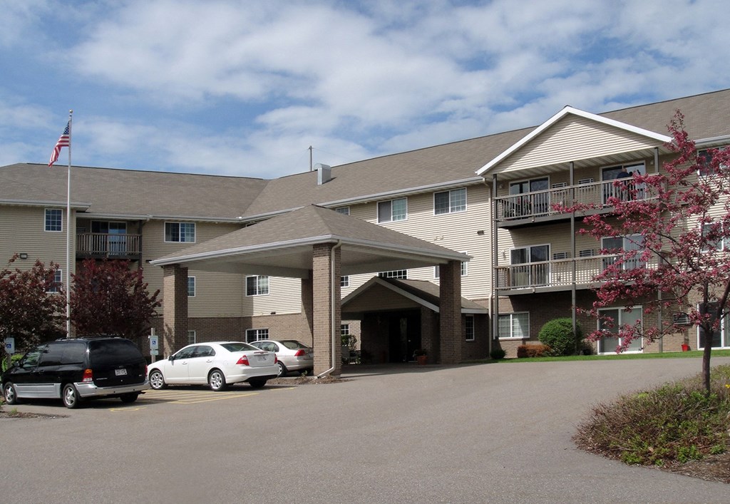 a building with cars parked in front of it