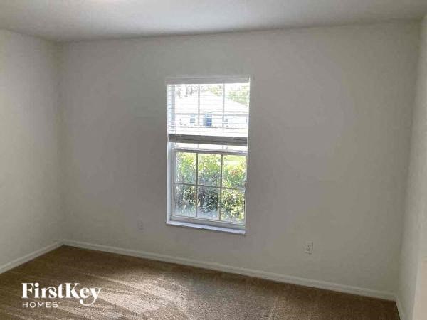 an empty room with a window in it