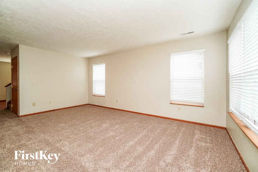 the living room is clean and ready to use