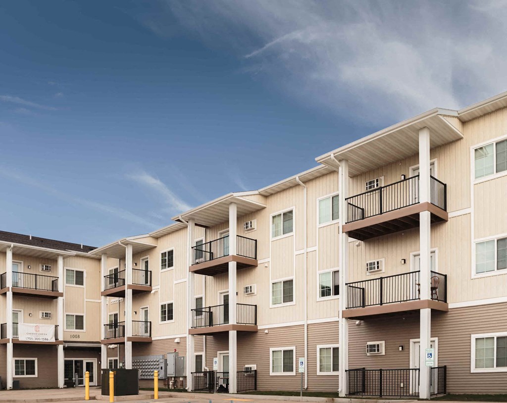 a row of apartments with balconies