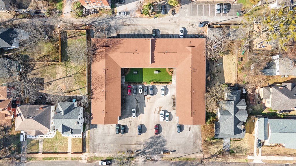 a view from above of a house with a green roof