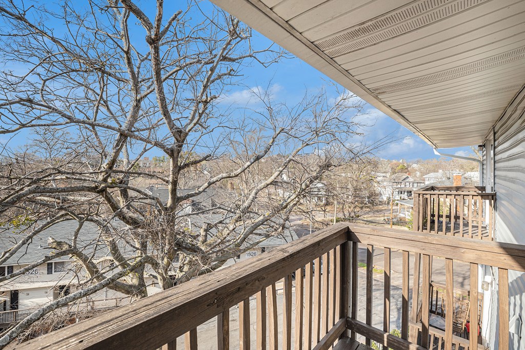 a view of the city from the deck of a home