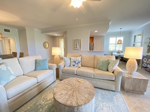 a living room with couches and a coffee table
