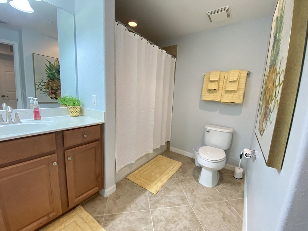 a bathroom with a toilet and a sink