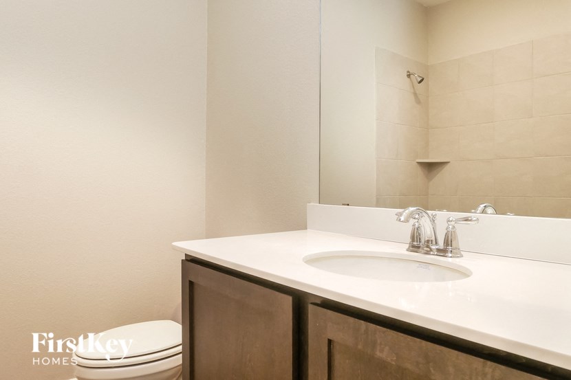 a bathroom with a sink and a toilet