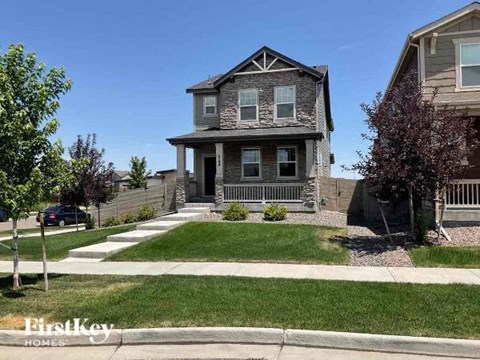 a house on the side of a street