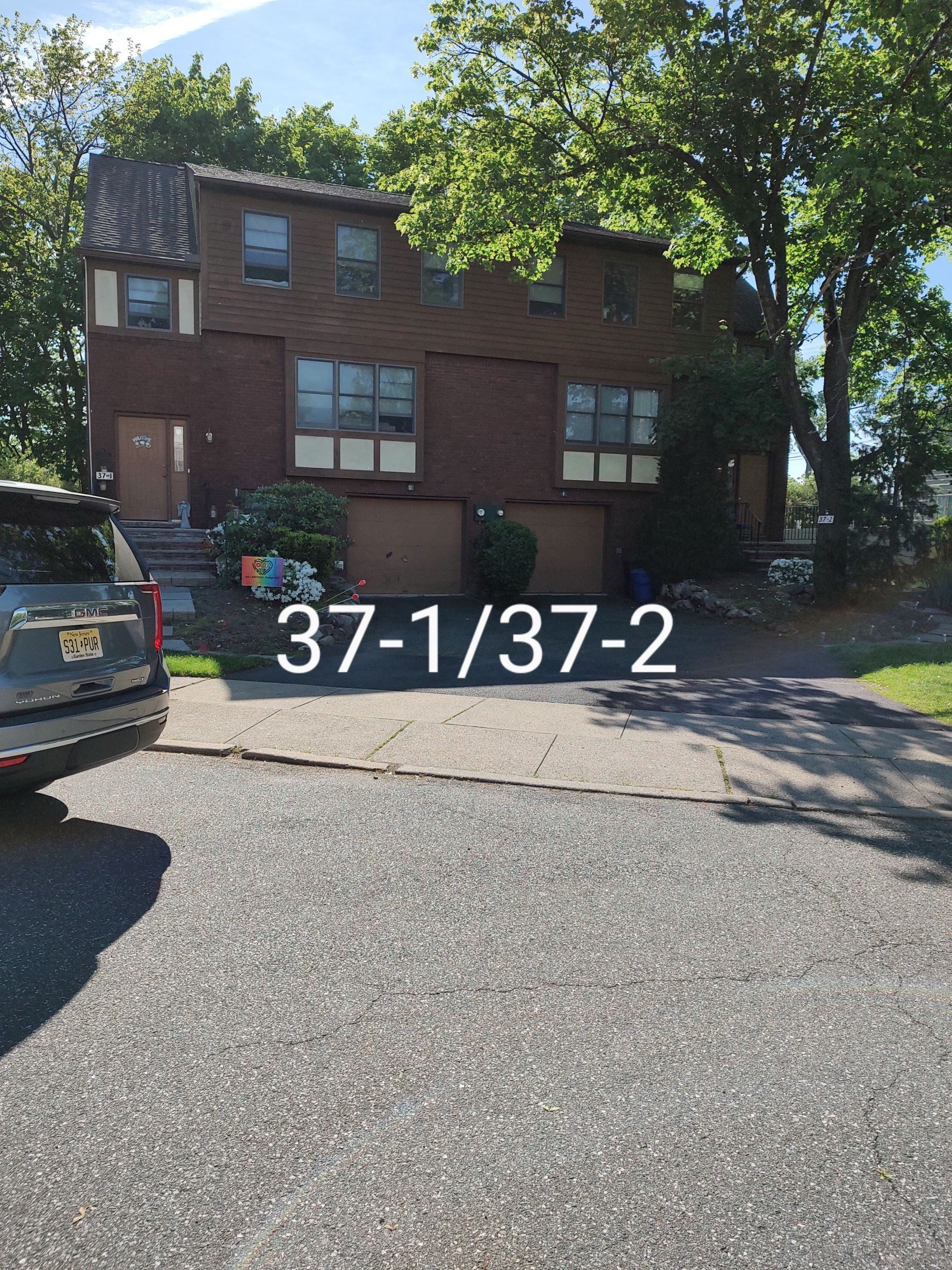 a view of the front of a house from the street