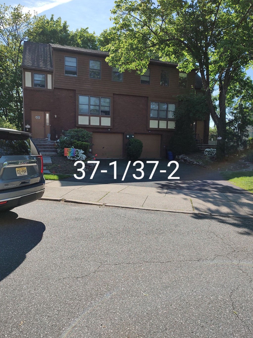 a view of the front of a house from the street