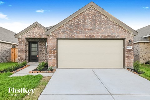 a new garage door on a brick house