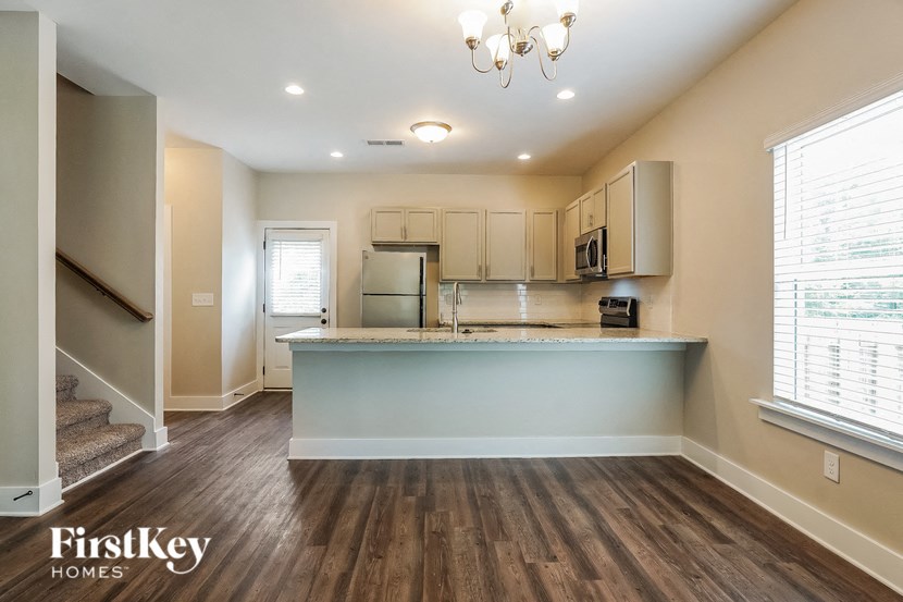 a kitchen with a blue counter top in a house