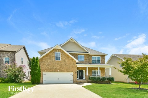A house with a garage is shown in the image.