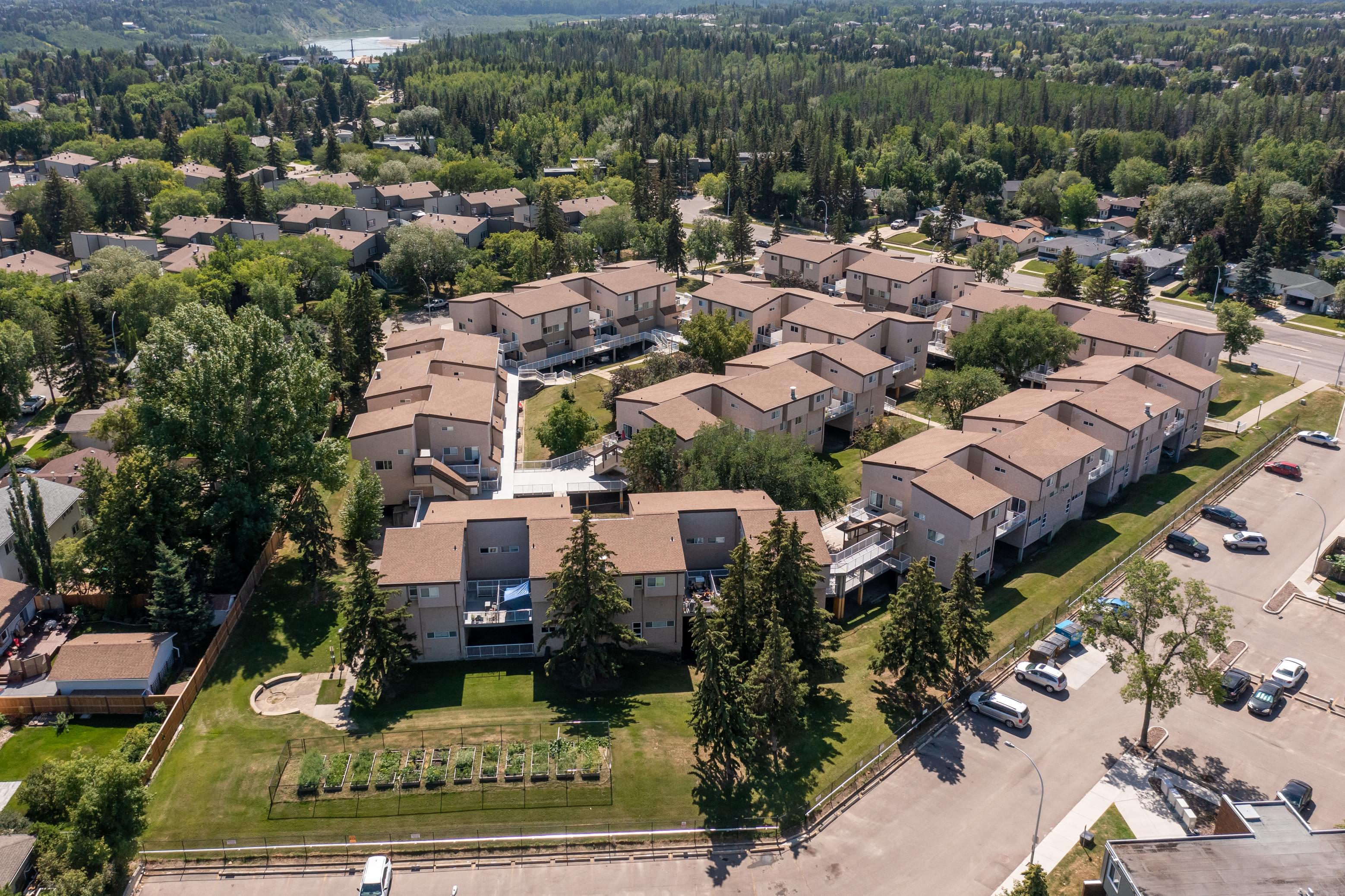 an aerial view of a group of houses in a neighborhood