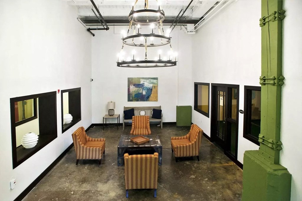 a large room with chairs and a table