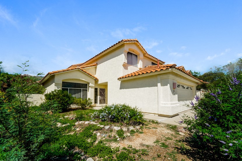 a house with a garden in front of it