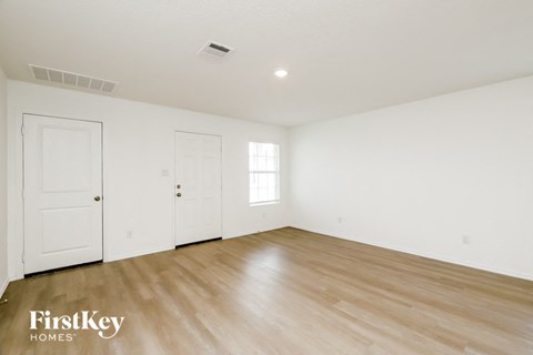 the living room is clean and ready for us to move in