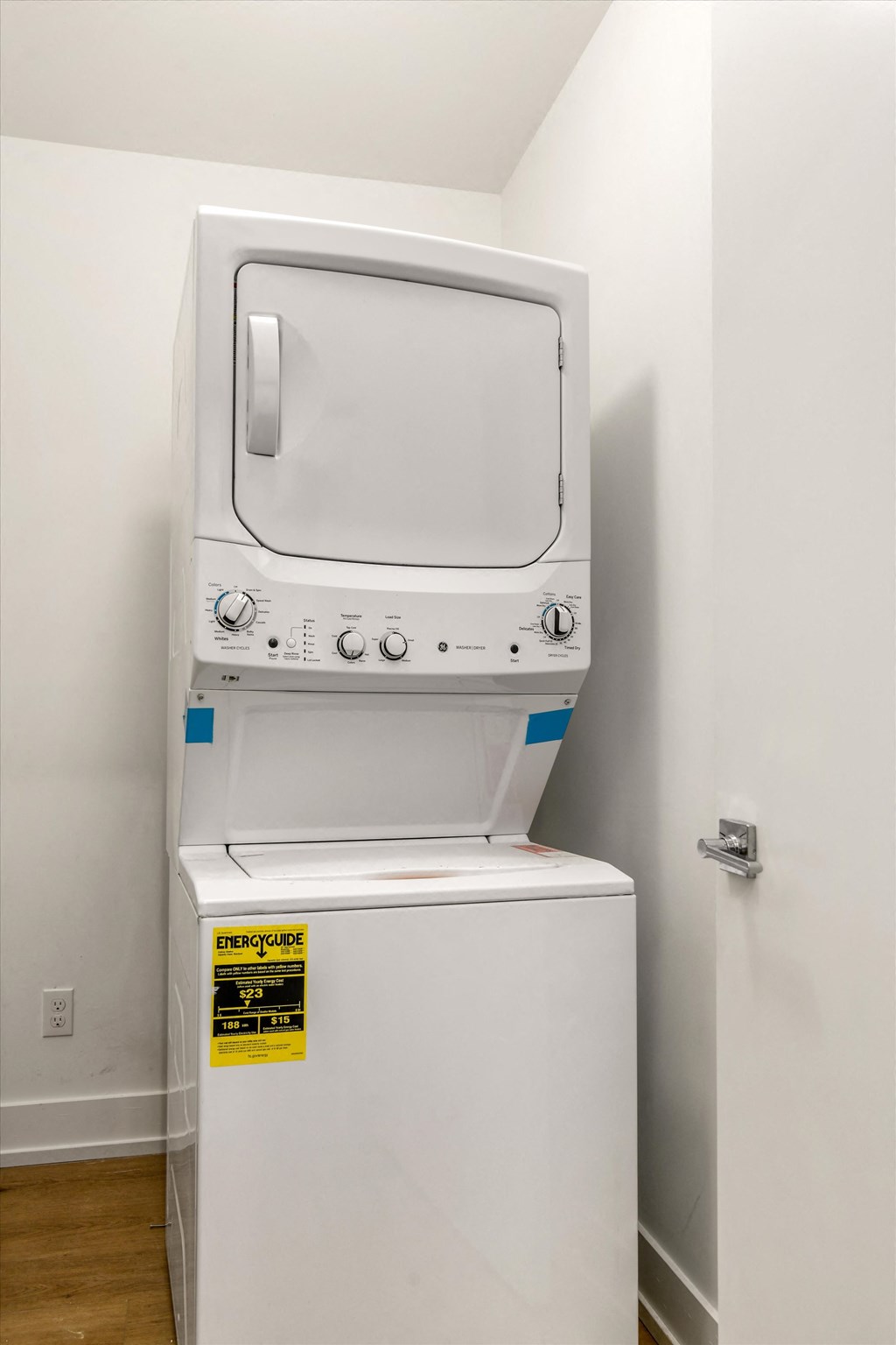 a washer and dryer sitting on top of a refrigerator